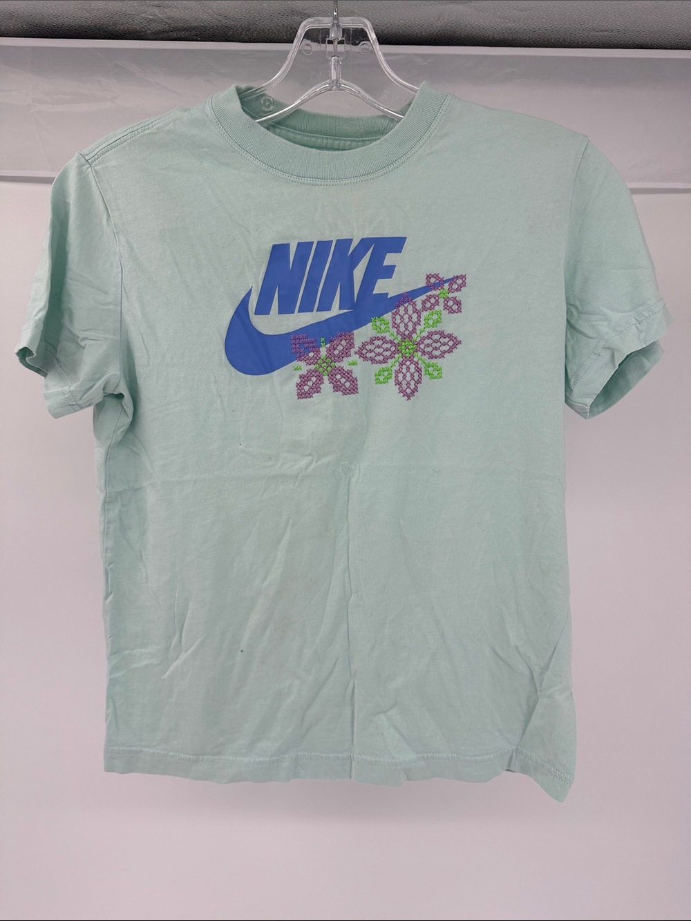 Nike Kids Mint Green Tee with Blue Logo and Floral Accents